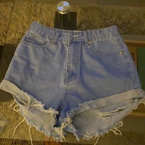 Blue ripped shorts